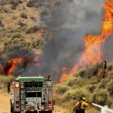 Plus de 600 pompiers luttent contre le "Madre Fire" qui s'est déclaré mercredi dans un région rurale du centre de la Californie. KEYSTONE/AP/Noah Berger